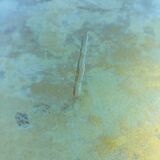 Vintage coffee table in agglomise glass and brass