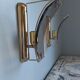 Pair of brass and curved glass wall lamps from the 80s