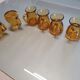 Set of original vintage small amber glass glasses.