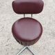 Set of 4 Mid Century Modern swivel chairs in tubular steel and leather.