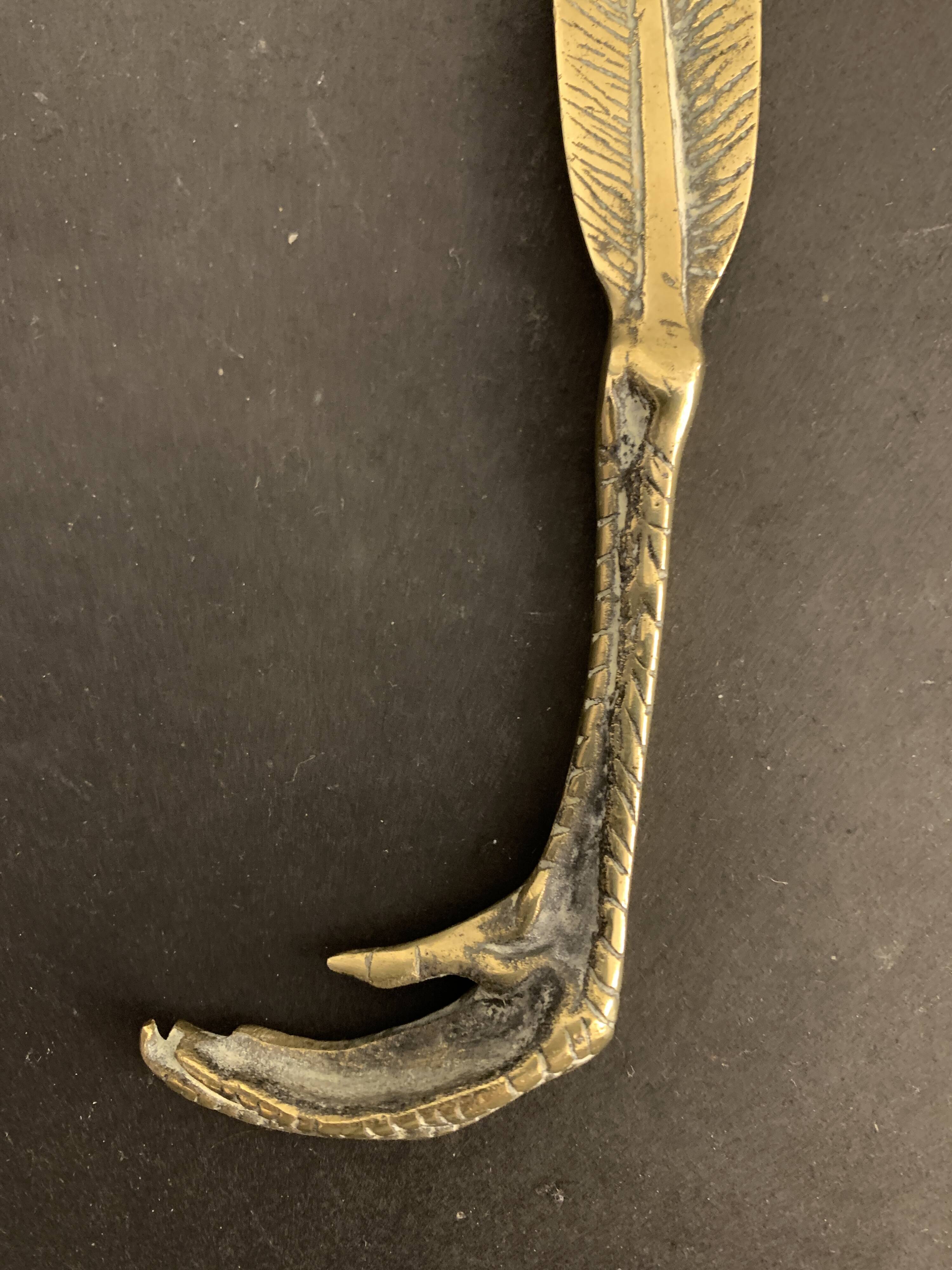 Paper cup or old bronze letter opener, eagle claw shape