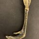 Paper cup or old bronze letter opener, eagle claw shape