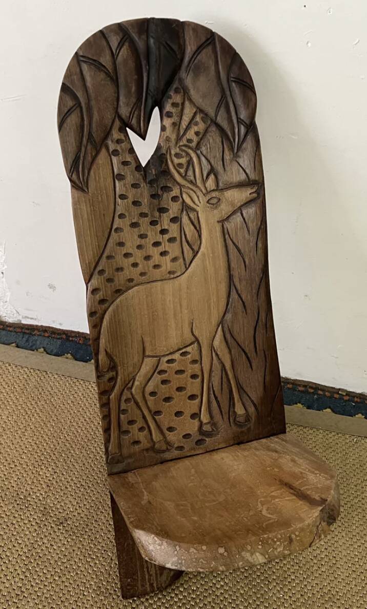 African carved wooden palaver chair