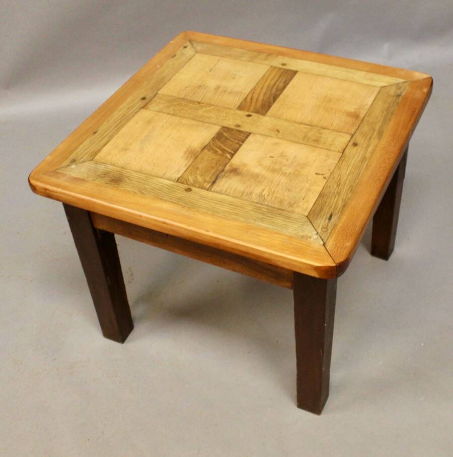 Coffee table on old parquet floor