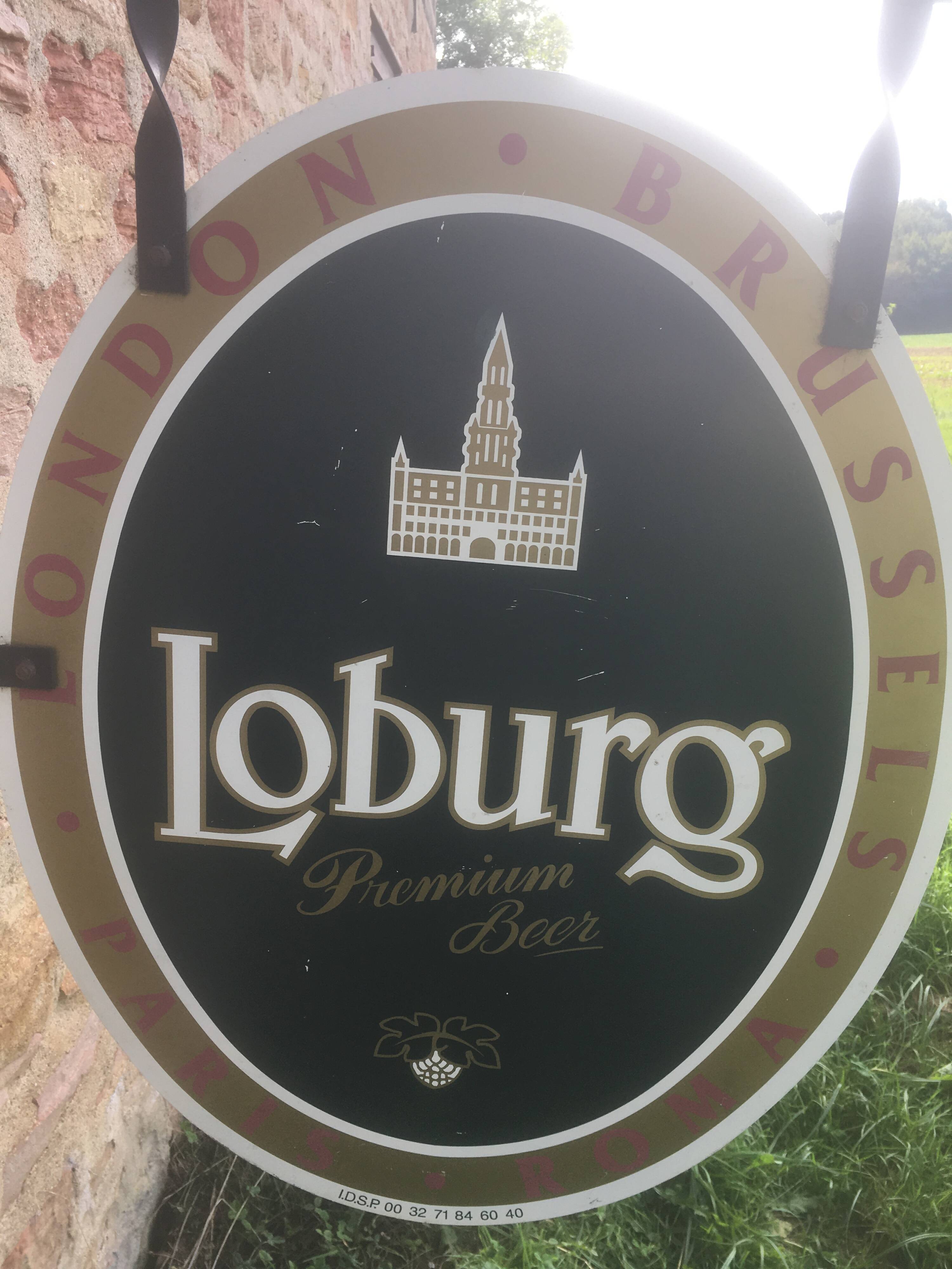 Double-sided "Loburg Beer" metal sign on wrought iron bracket