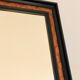 Old wall mirror 72 x 52 cm in black wood and faux mahogany