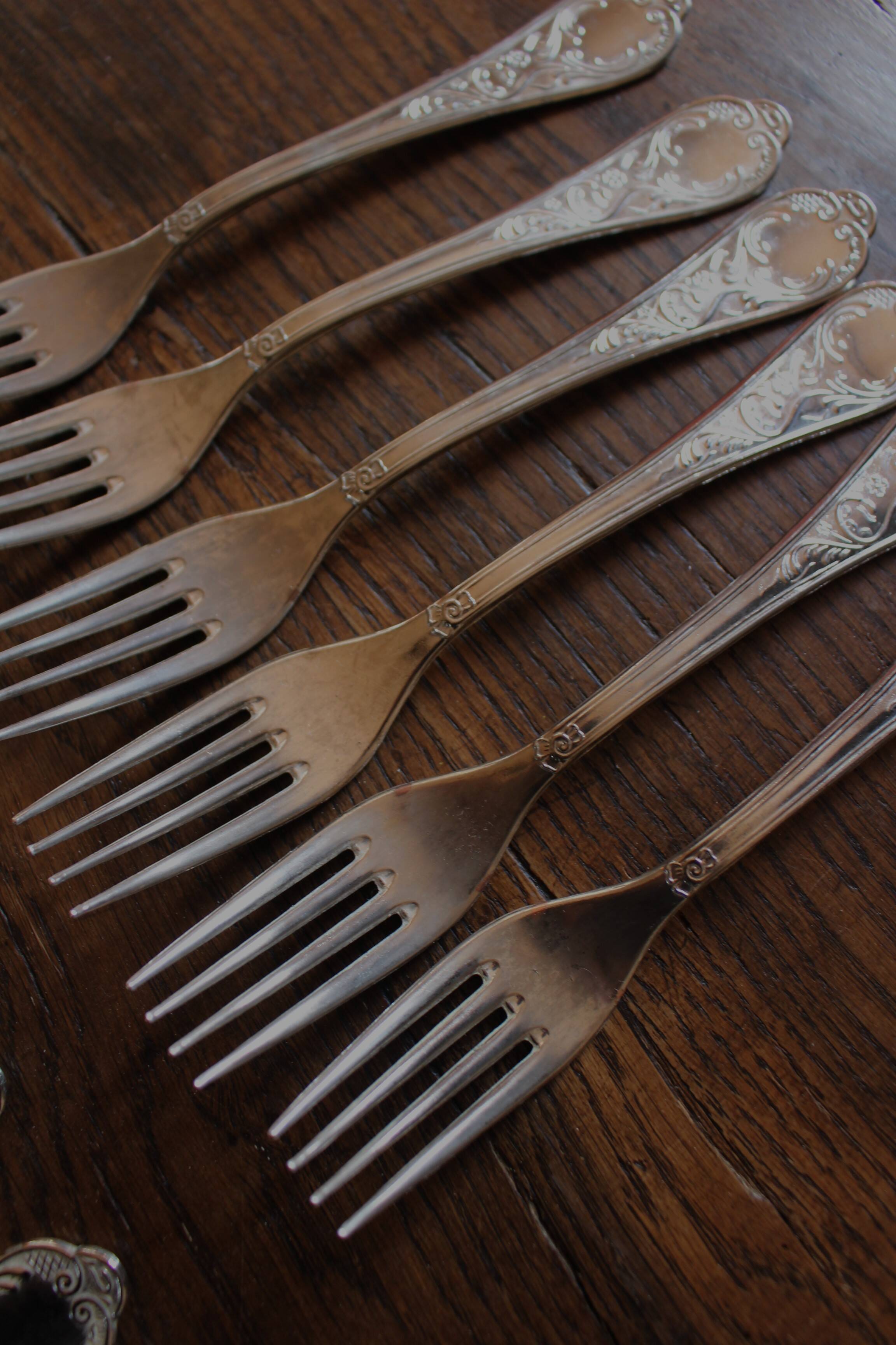 A set of 6 forks + 6 spoons silver metal foliage
