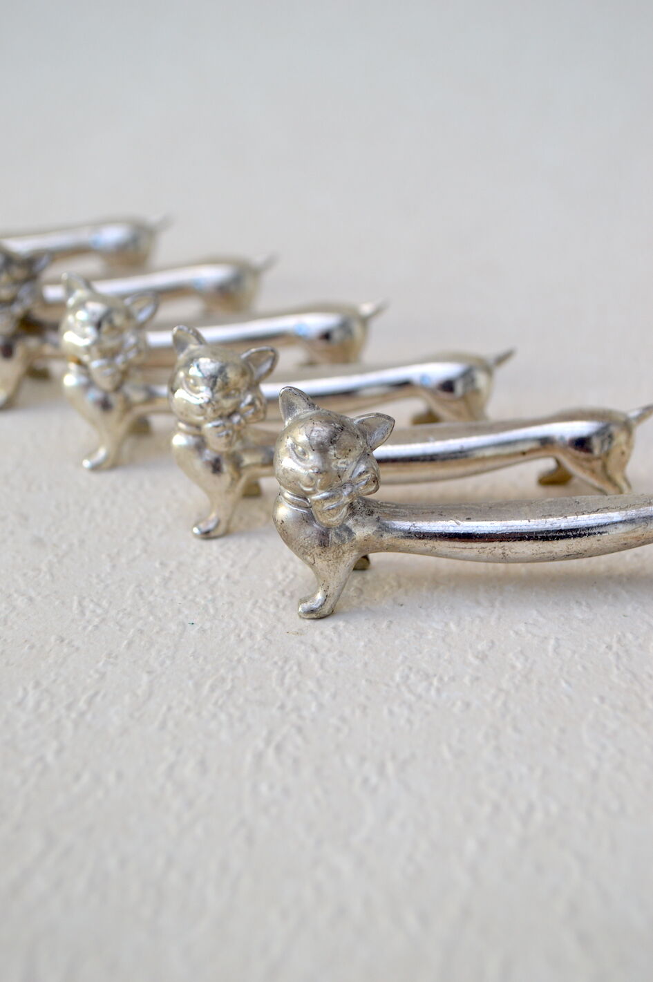 6 silver cat knife rests