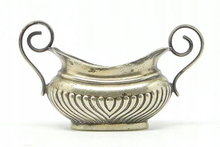 Pre-war decorative salt shaker with ribbed body