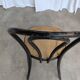Chaise de salle à manger vintage style Thonet en bois noir et assise en cannage 1970