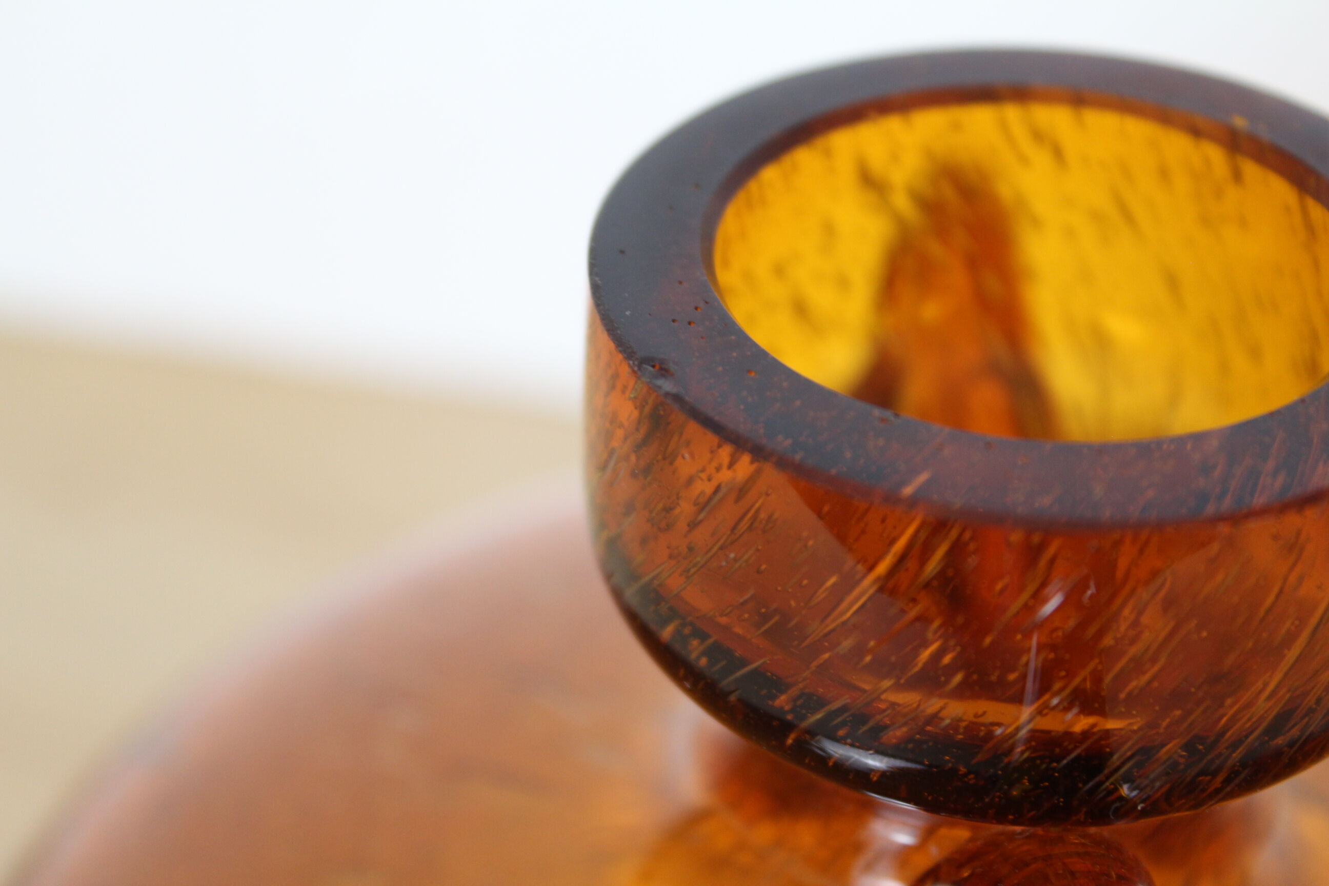 Biot's orange glass vase with orange coves