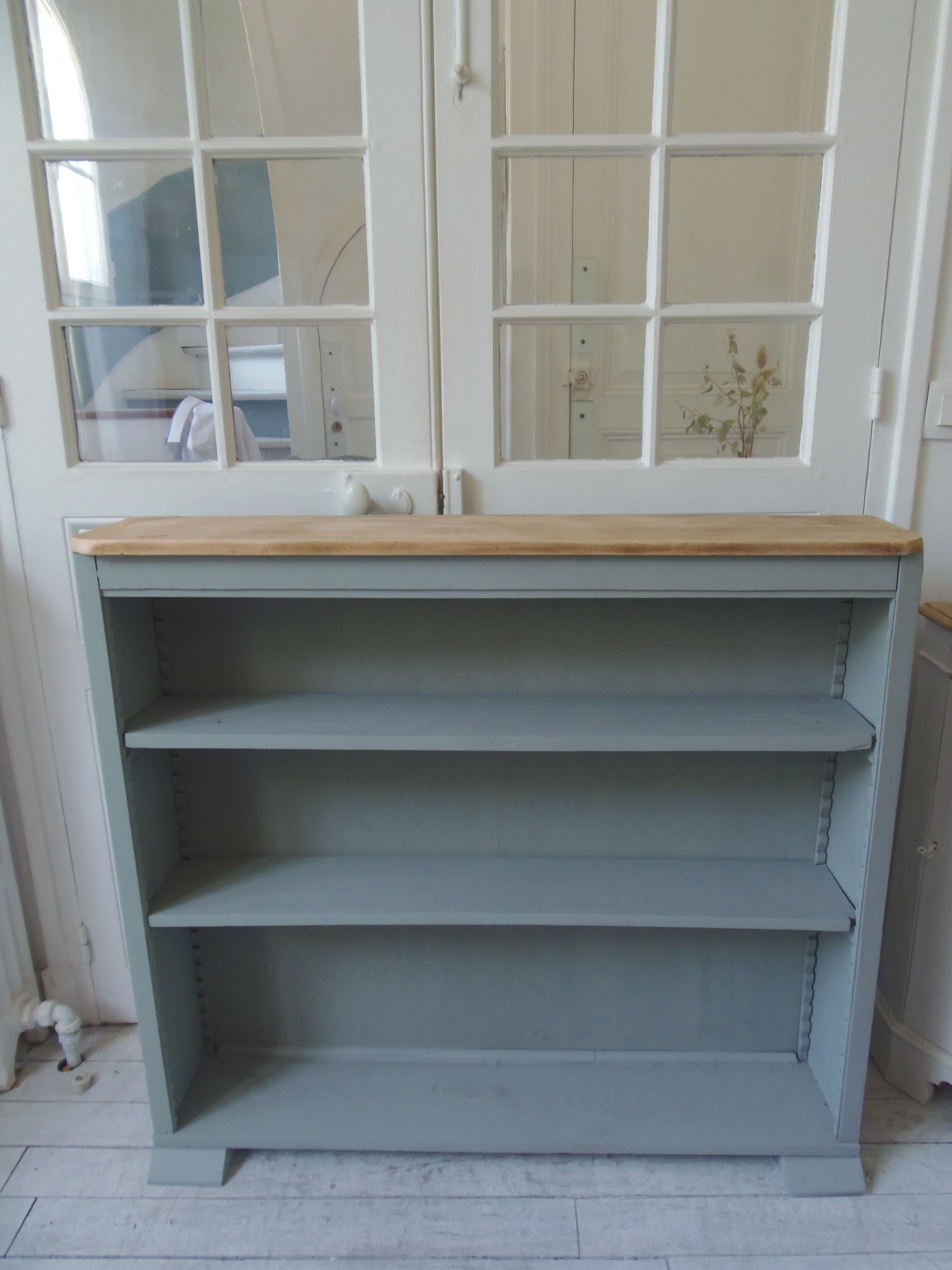 Vintage shallow bookcase, re-enchanted in gray green, wooden tray.