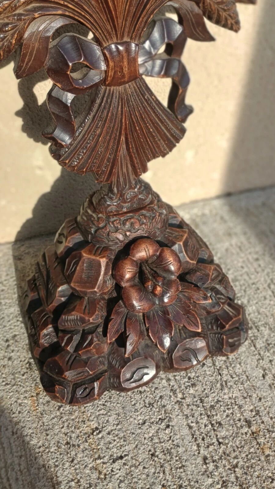 Antique wooden crucifix carved from the Black Forest with grapes and leaves.