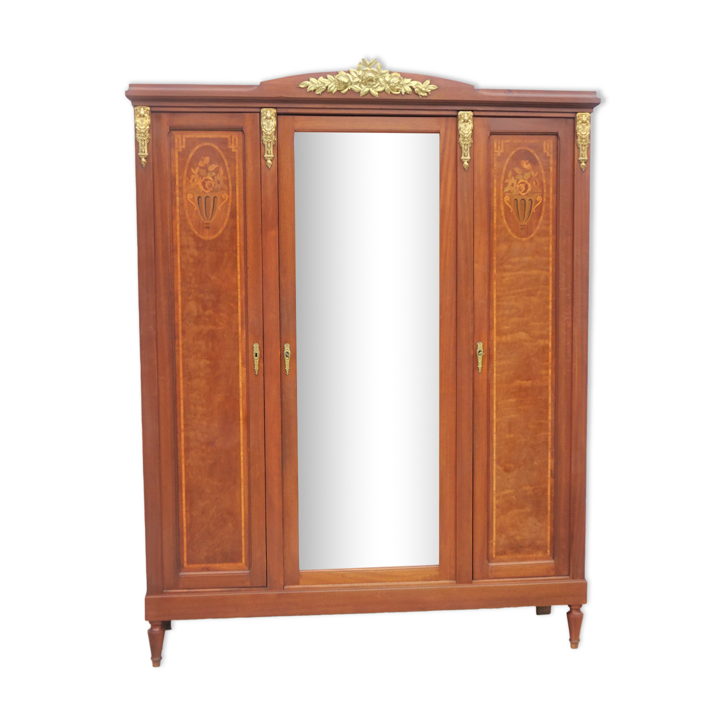 Louis XVI style wardrobe late nineteenth century, mahogany and marquetry