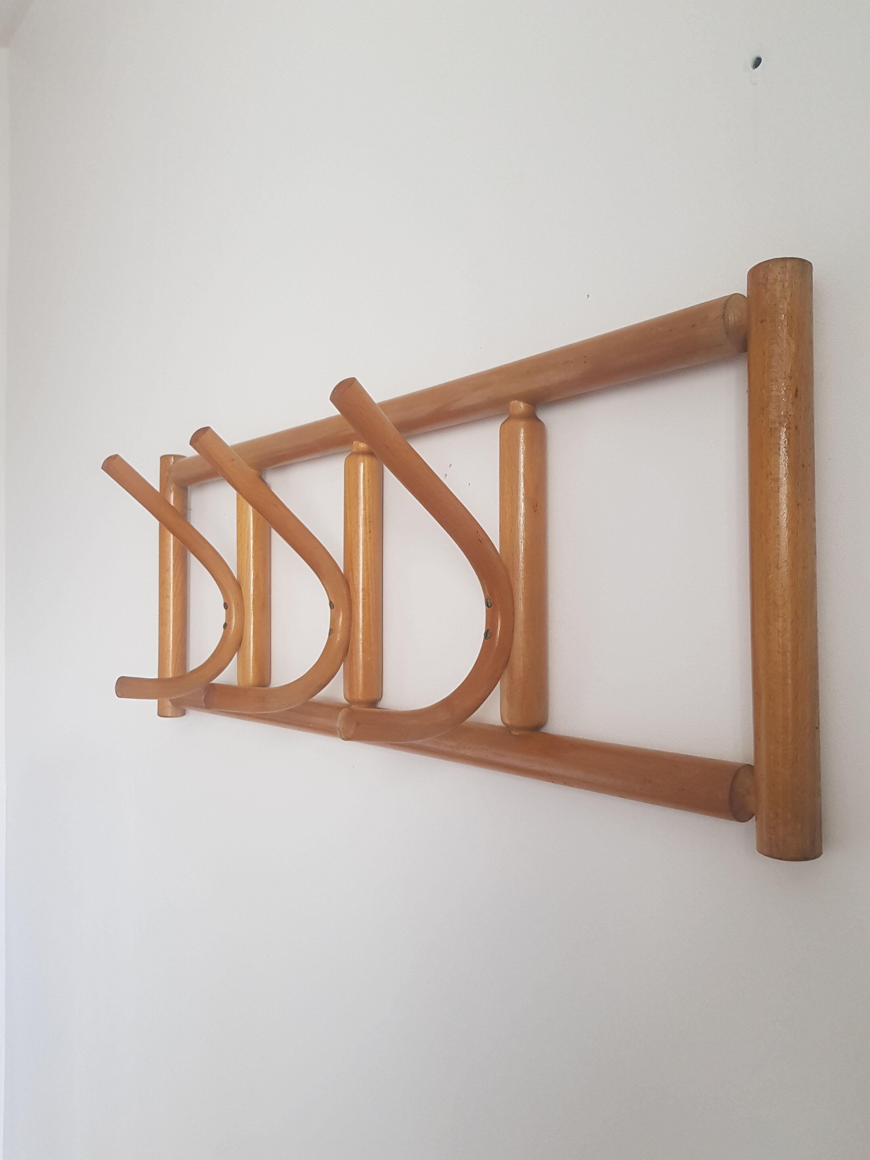 Wooden wall coat rack