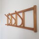 Wooden wall coat rack