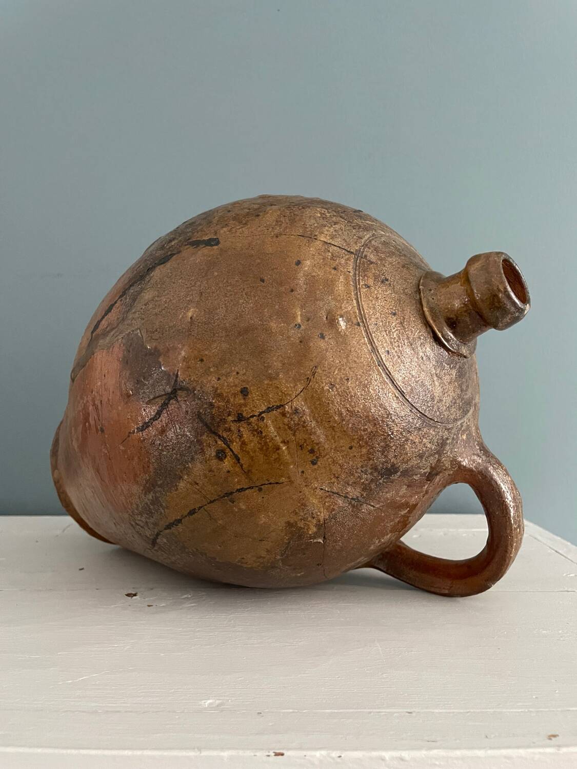 Large 19th century oil bottle in glazed earthenware