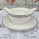 Round sauceboat on Longwy France earthenware frame, Trianon model