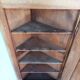 Corner cabinet in carved walnut, Savoyard style.