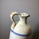 Painted terracotta bottle in black style signed CS bird painting floral decoration