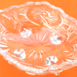 1970s oblong cup, empty pocket on 4 small feet glass decoration in relief