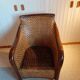 Fauteuil rotin tressé et bois exotique