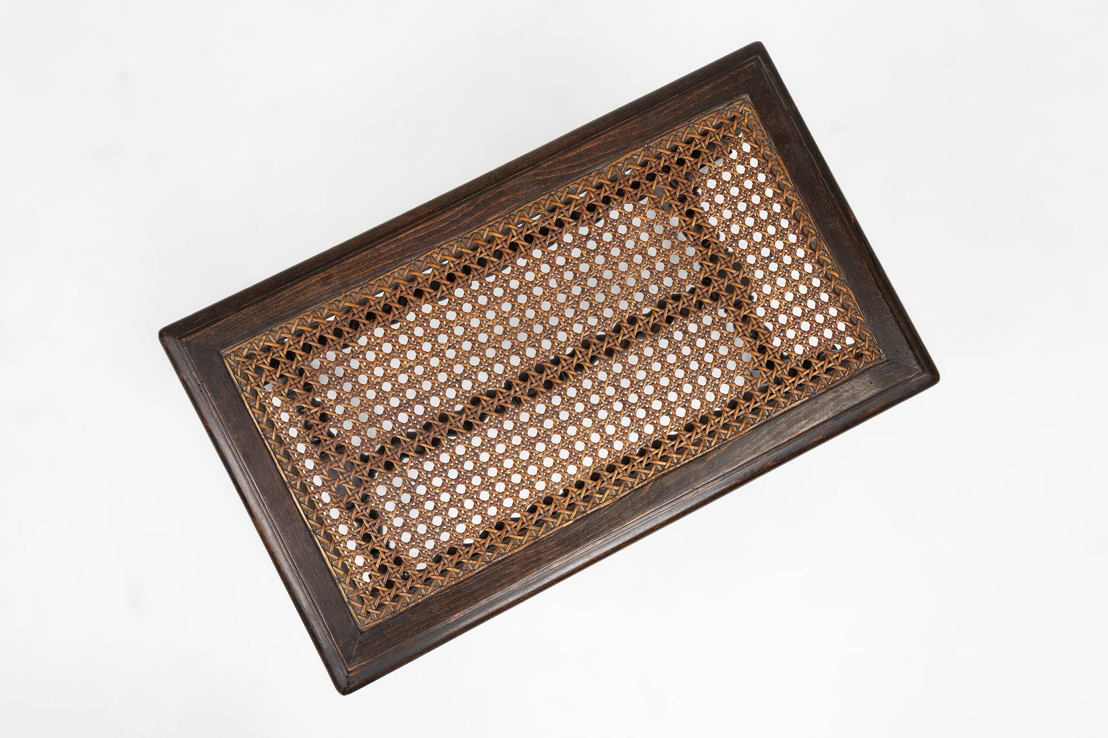 Antique French wooden stool with rattan top, ca. 1880