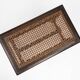 Antique French wooden stool with rattan top, ca. 1880
