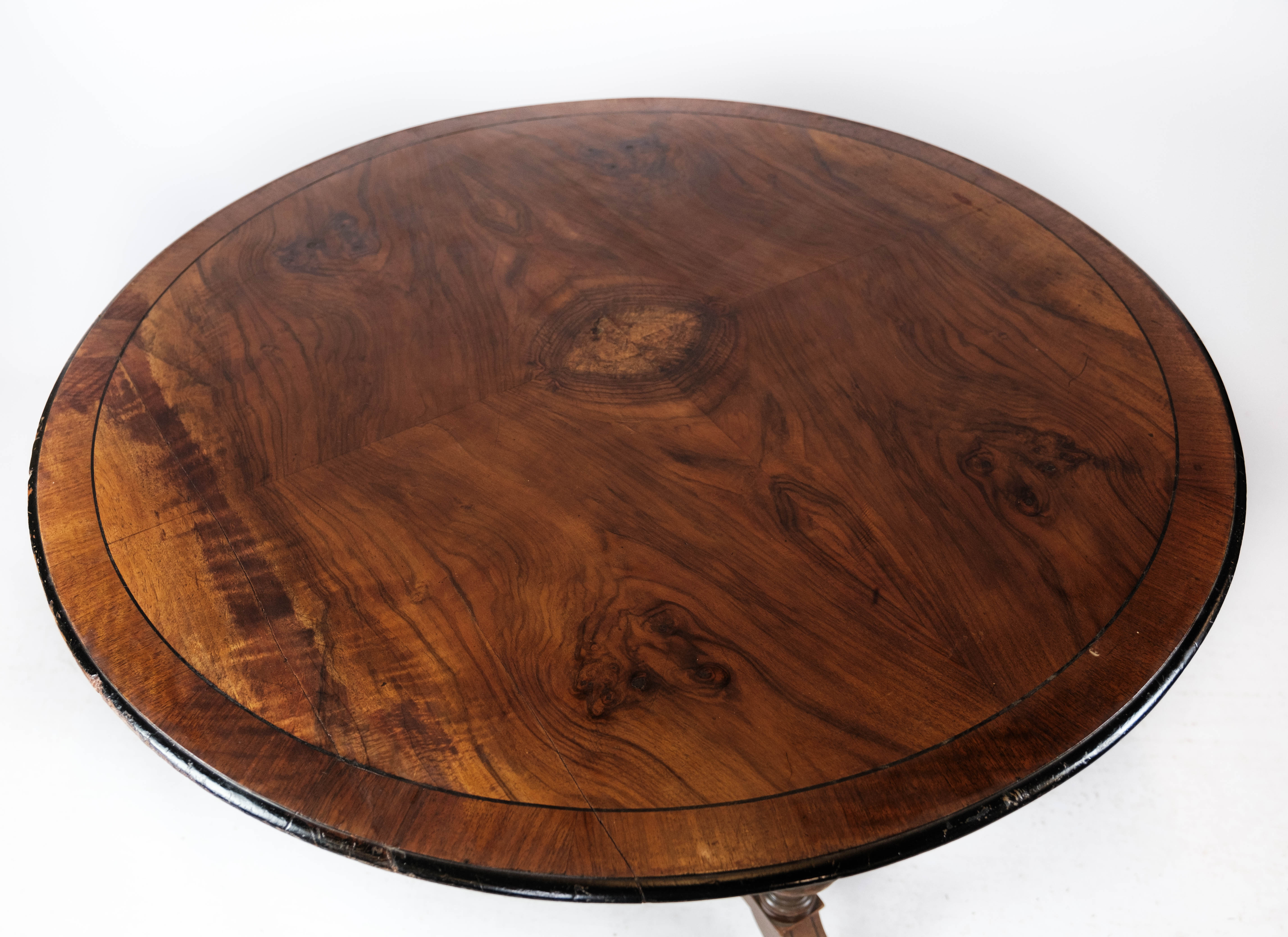 Round dining table of walnut with inlaid wood, 1890s