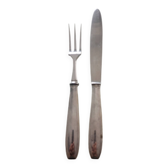 Serving cutlery in silver metal