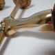 Pair of vintage patinated golden metal hand sconces