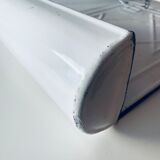 Old enamelled kitchen utensil display