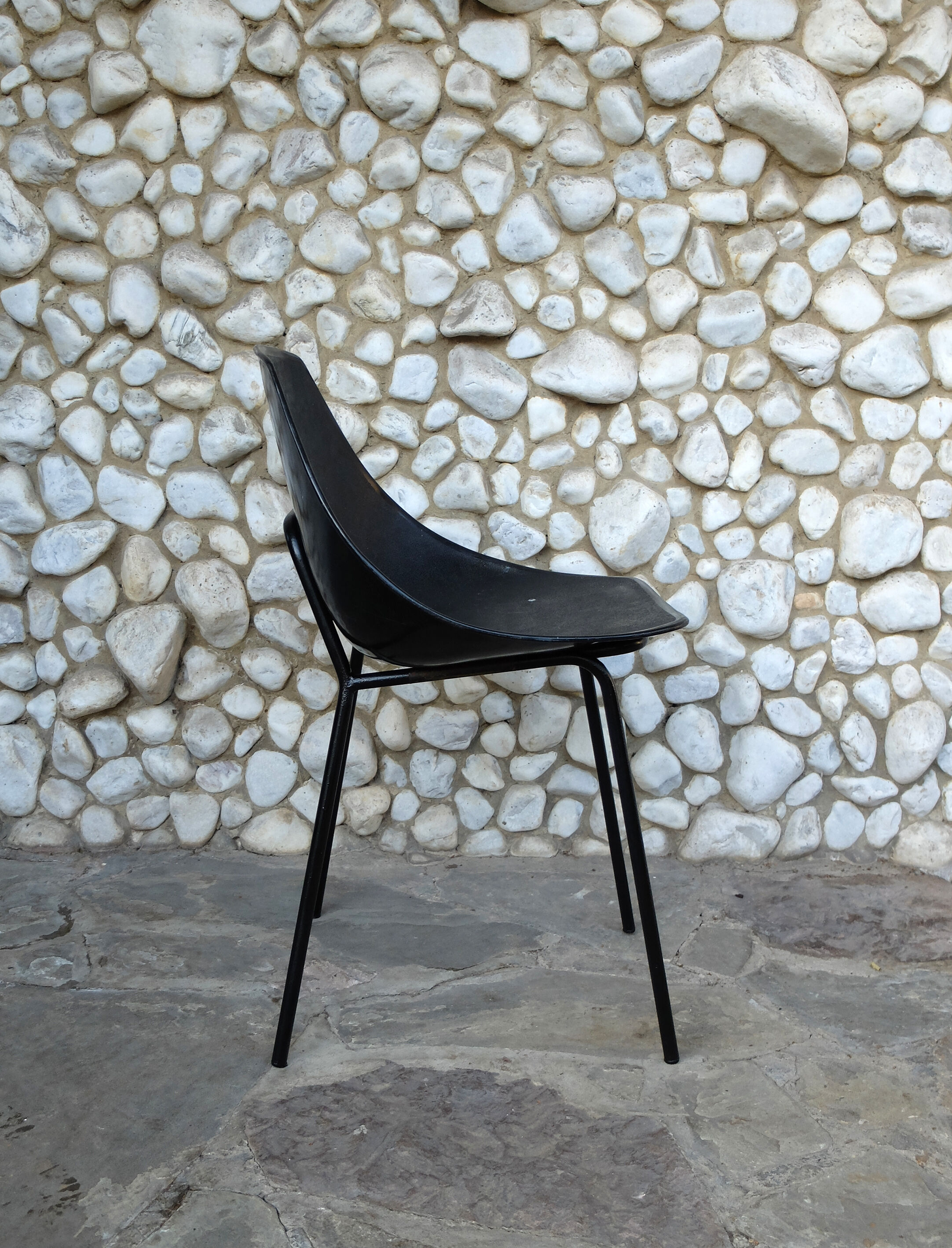 Black shell chair Pierre Guariche for Meurop 1960s