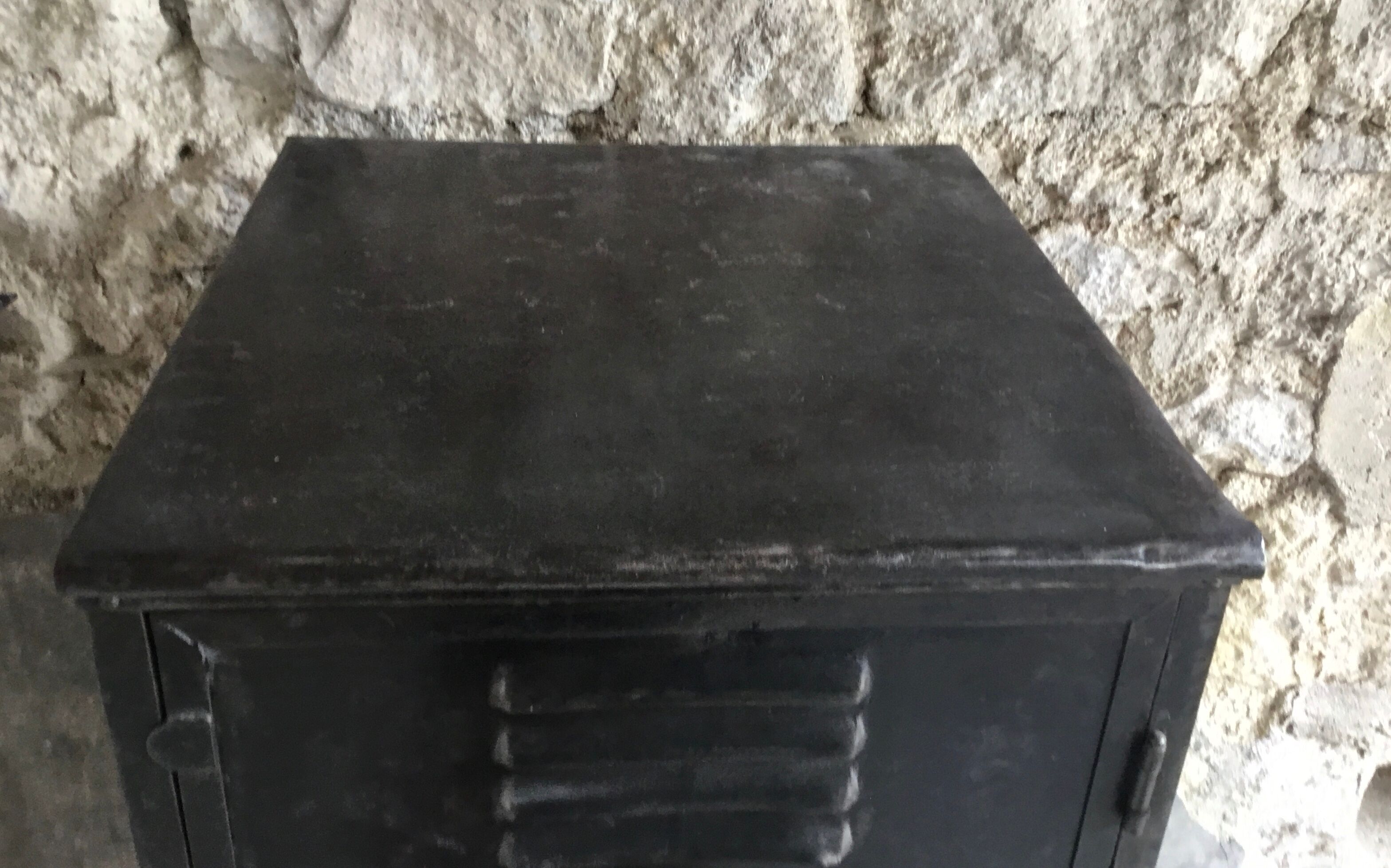 Riveted cloakroom converted into storage cabinet - early twentieth century