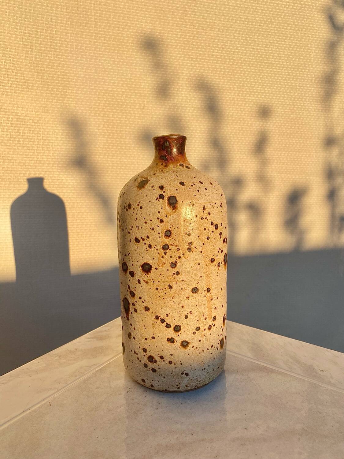 Vintage speckled stoneware vase