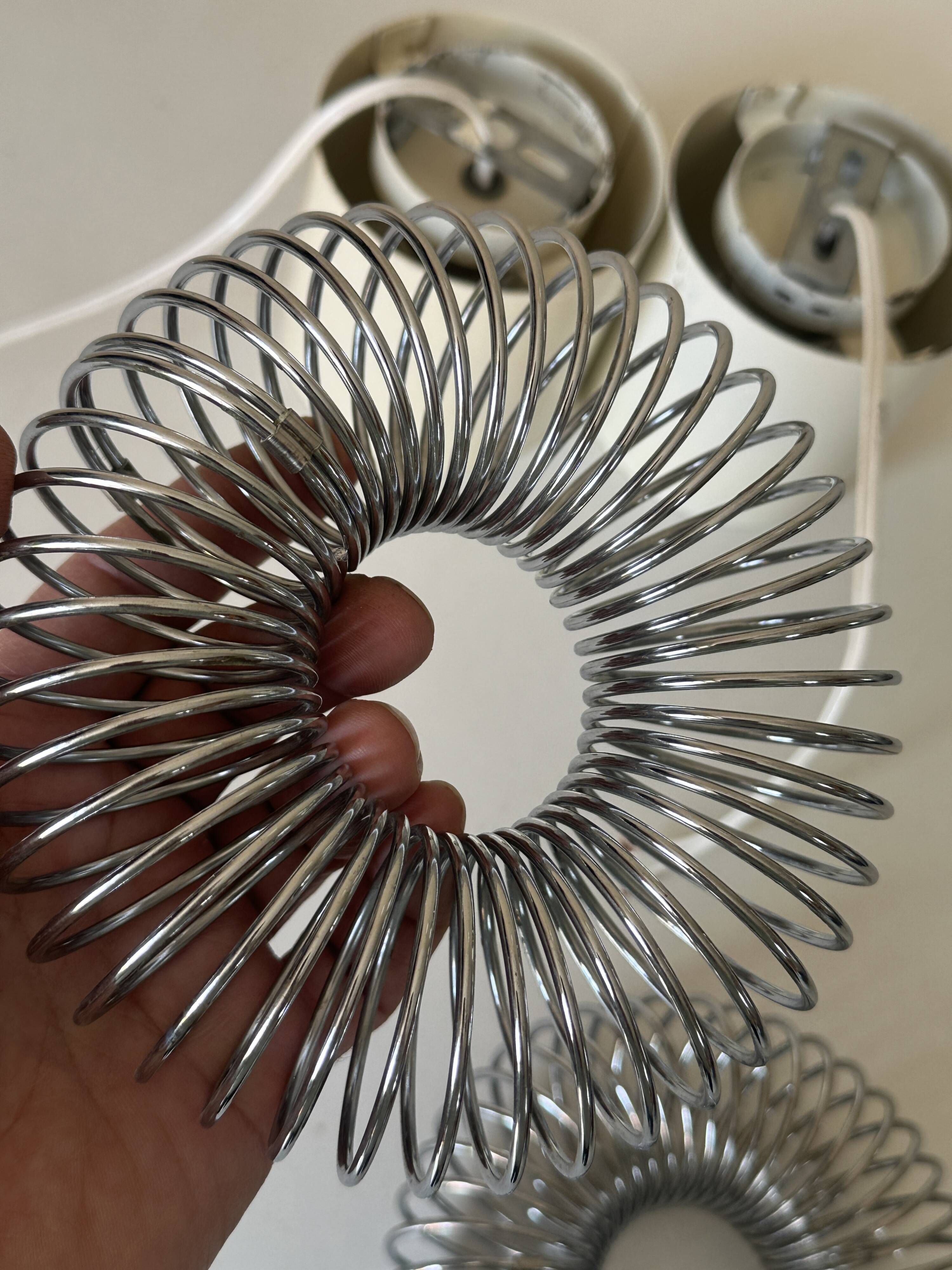 Pair of vintage design spring lamp wall lights from the 70s