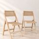 Paire de chaises pliantes en cannage et bois