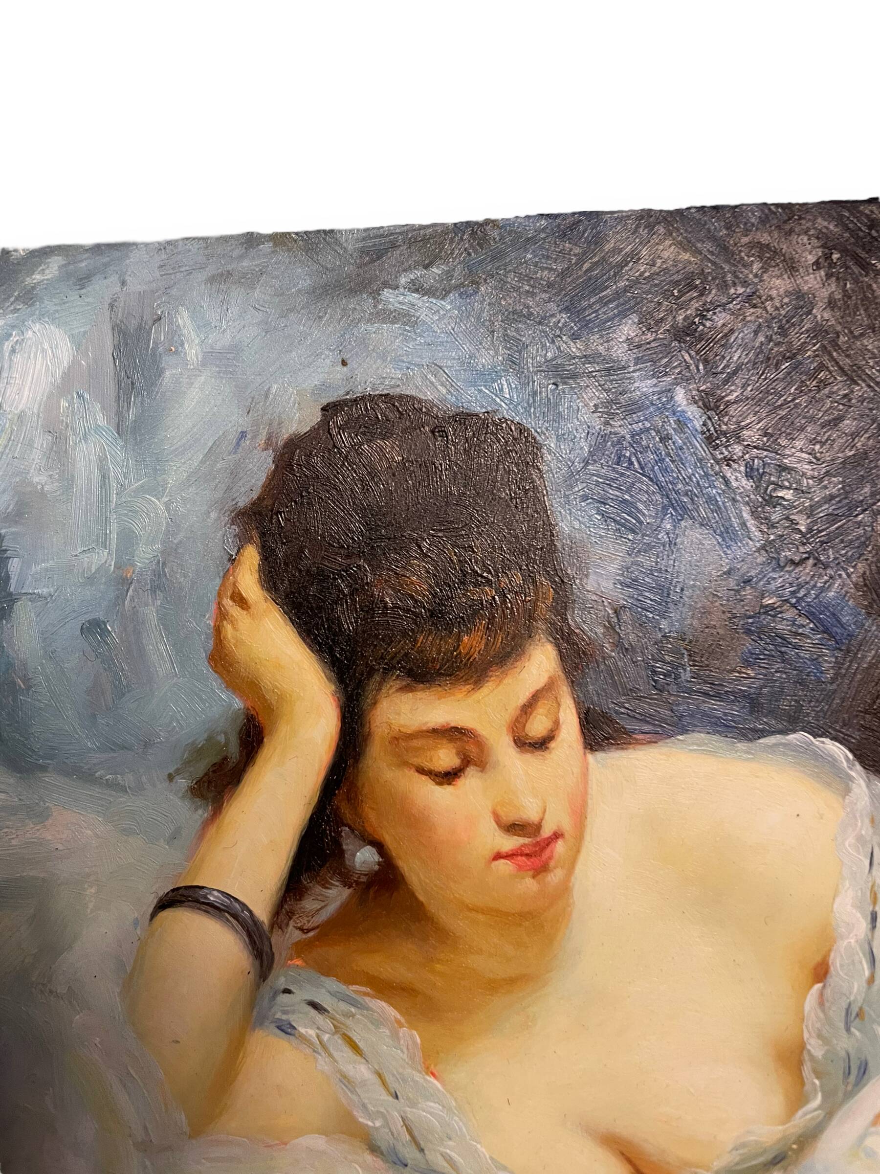 Young woman lying reading oil on panel