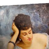 Young woman lying reading oil on panel