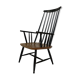 Vintage easy chair with high back and armrest from the 60s