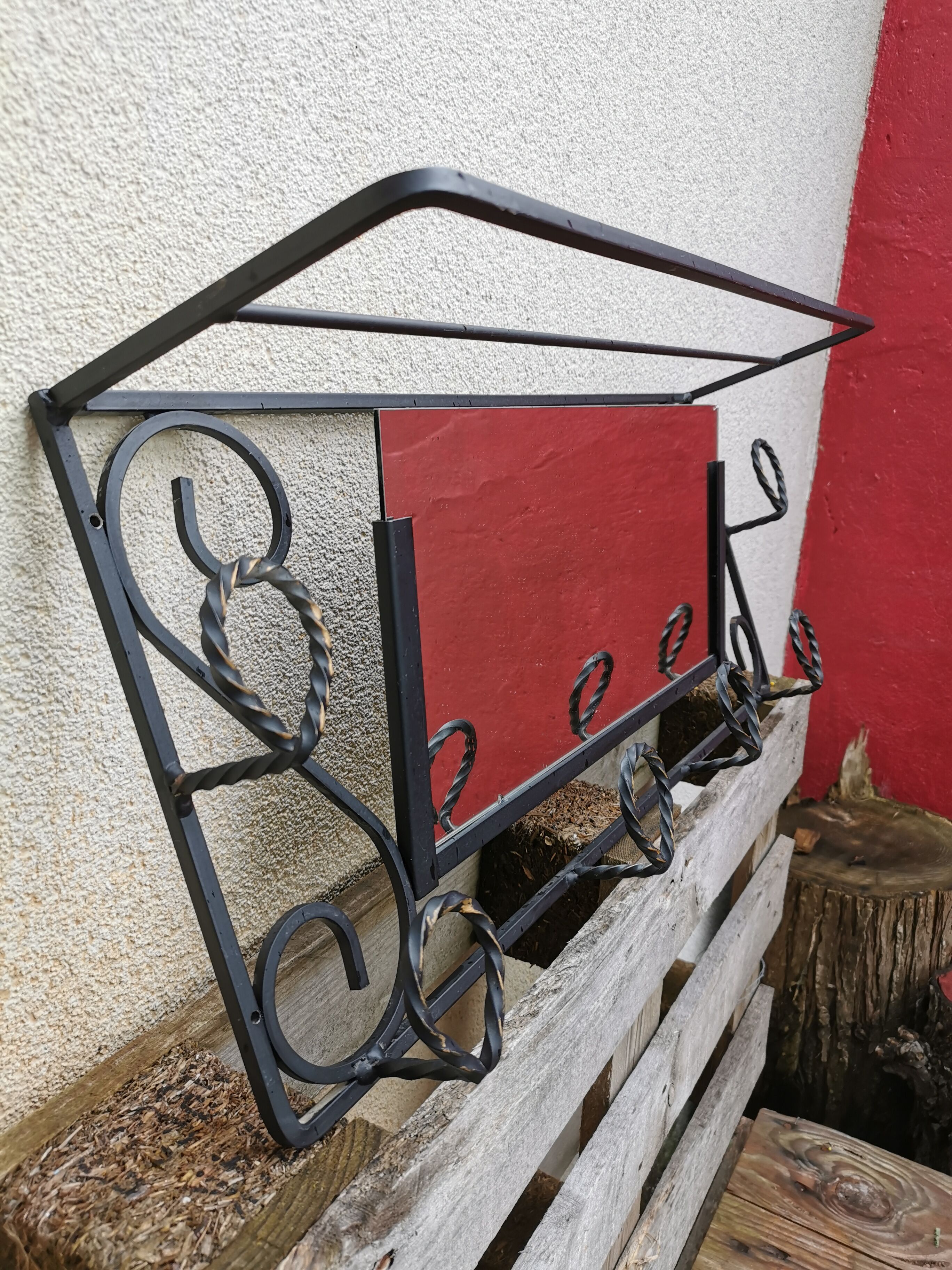 Vintage wrought iron coat rack