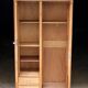 Art Nouveau wardrobe in blond wood with beveled mirror (circa 1909).
