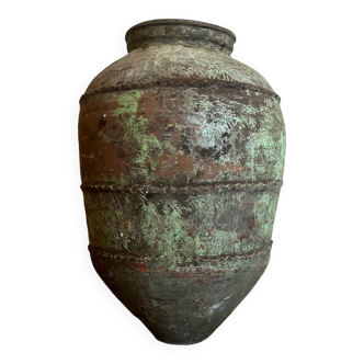 Large old green jar