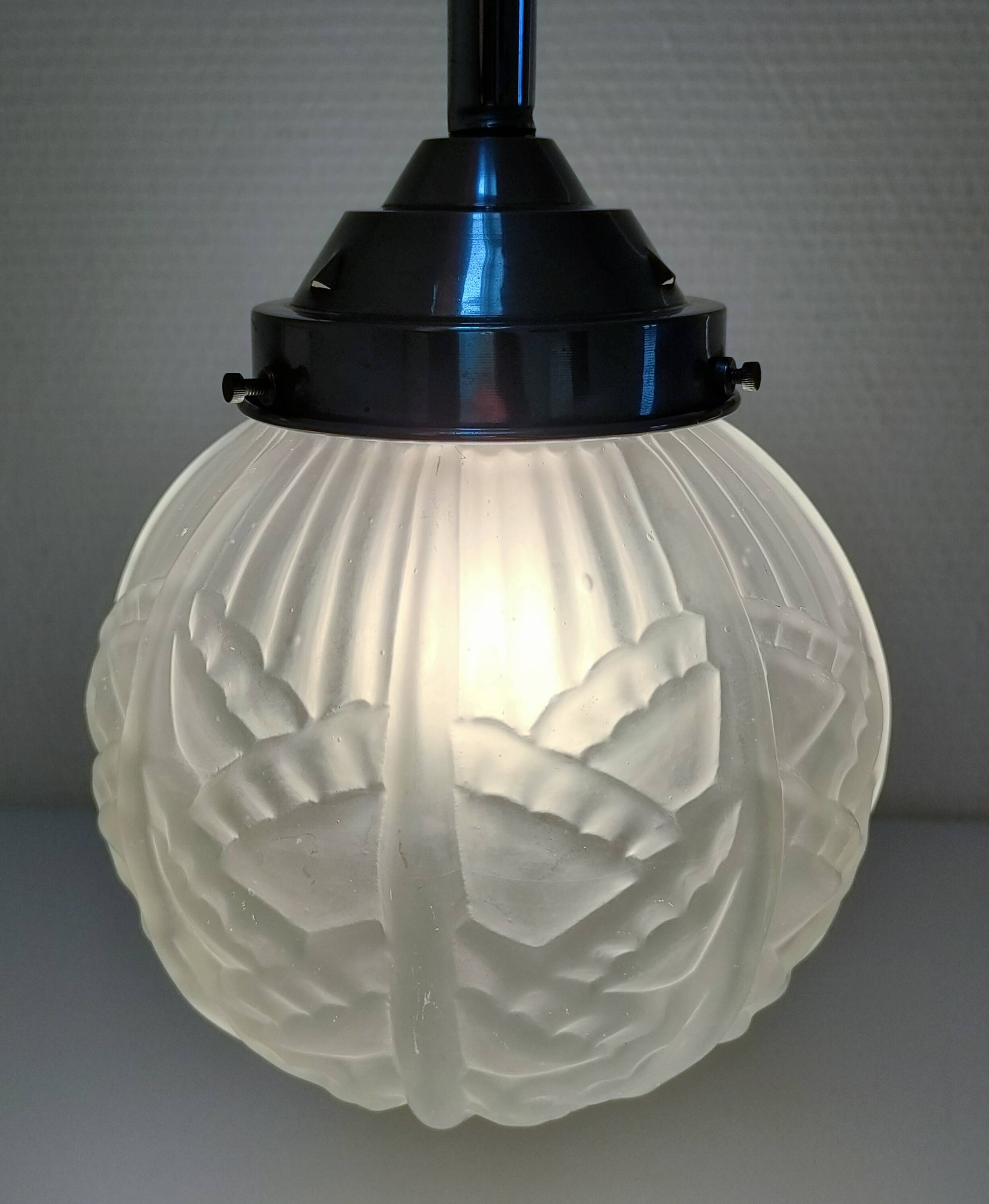 art deco pendant light with molded glass and chrome-plated metal frame