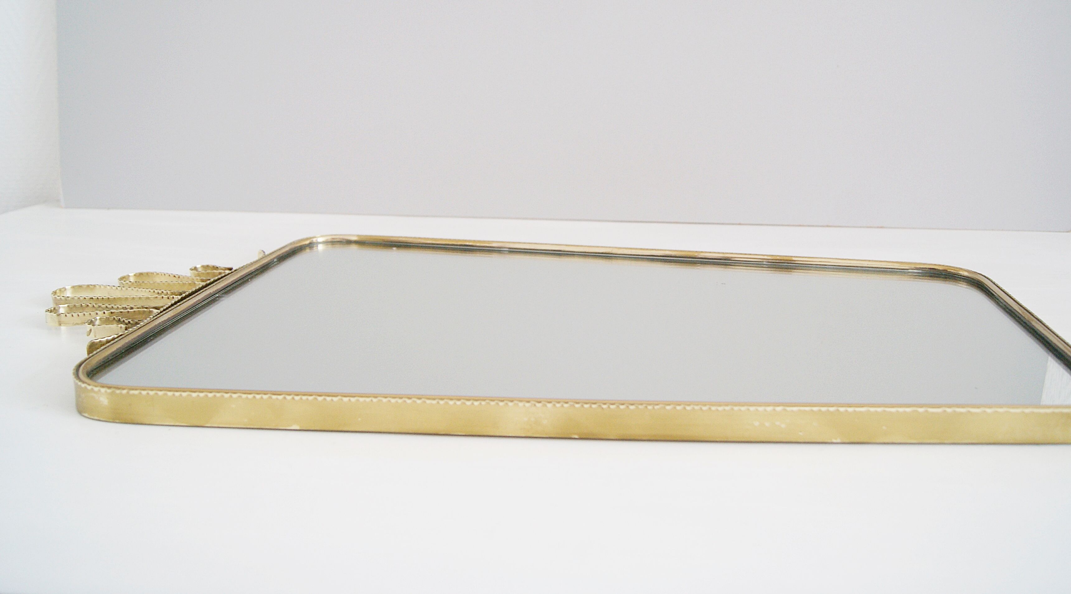 Mid century brass mirror, 40x74cm