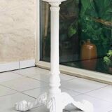 Round marble table with central cast iron leg