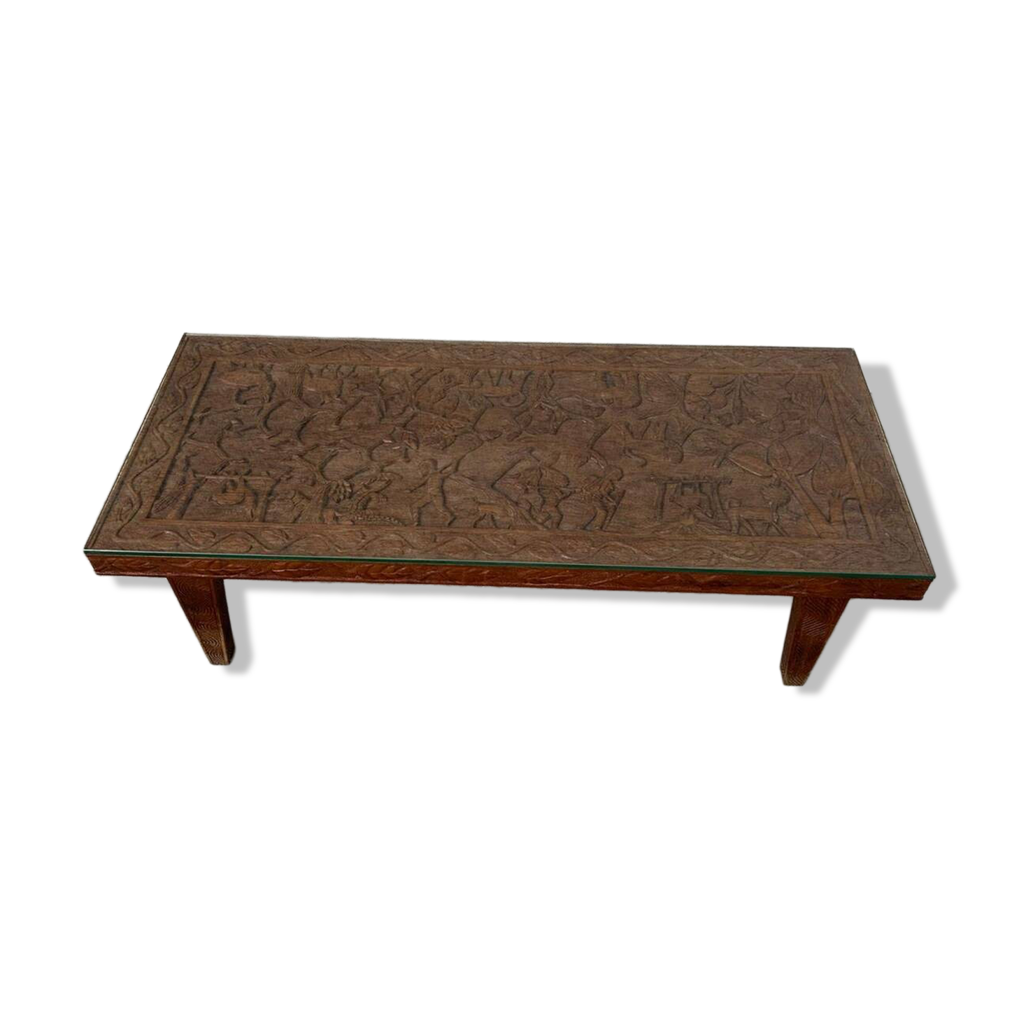 Afro style carved wooden table with glass top