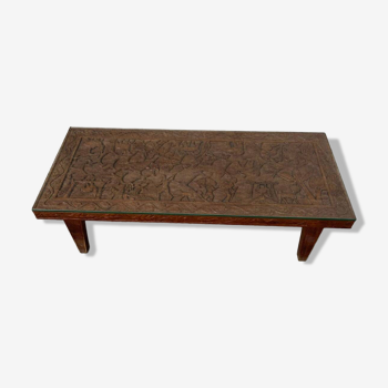 Afro style carved wooden table with glass top