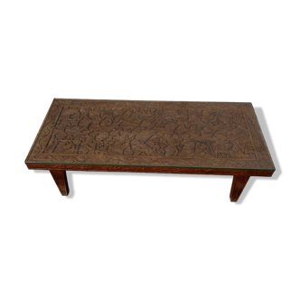 Afro style carved wooden table with glass top