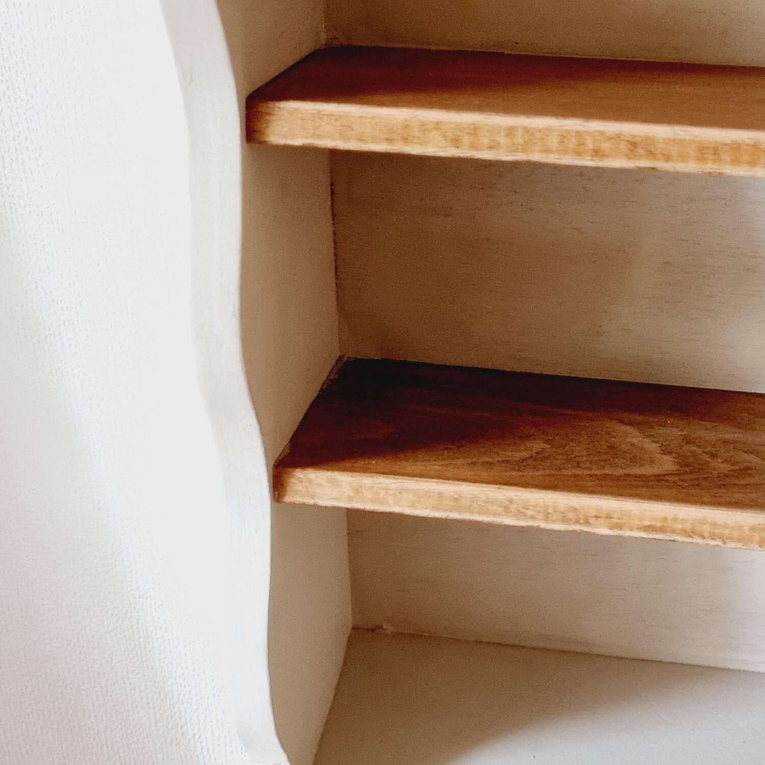 Linen-colored wooden shelf